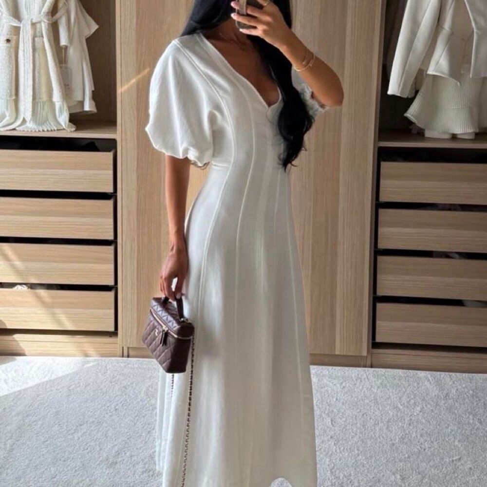 Zara feminine, elegant white maxi dress with a soft, romantic look